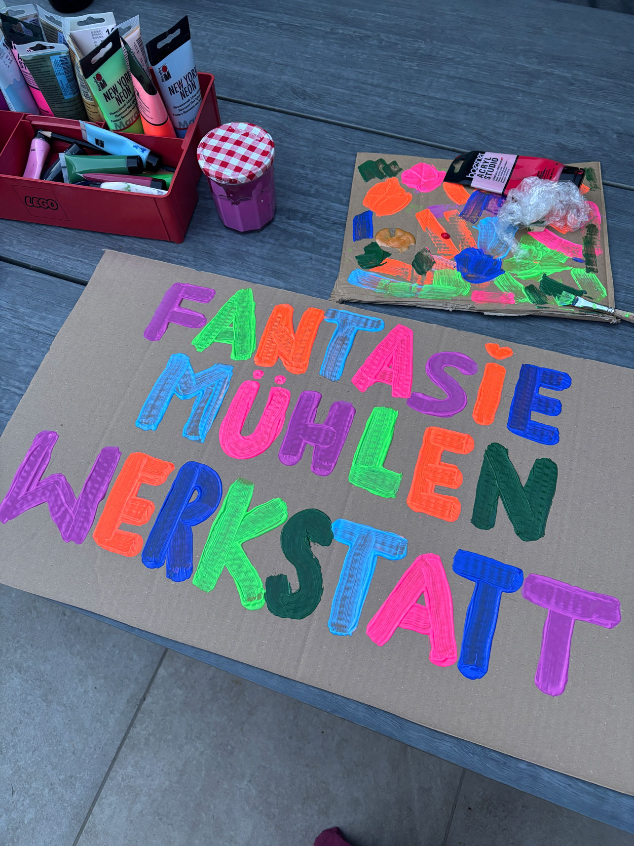 Handgemaltes Schild der Mühlenwerkstatt